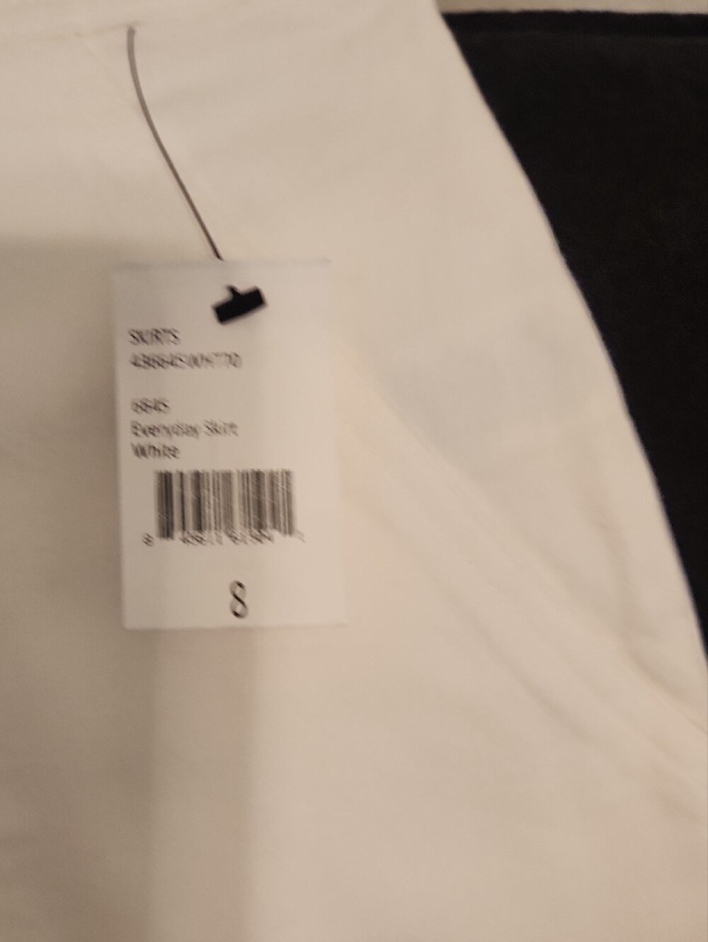 CAbi White Mini Skirt with Patch Pocket Details - Picture 2 of 3